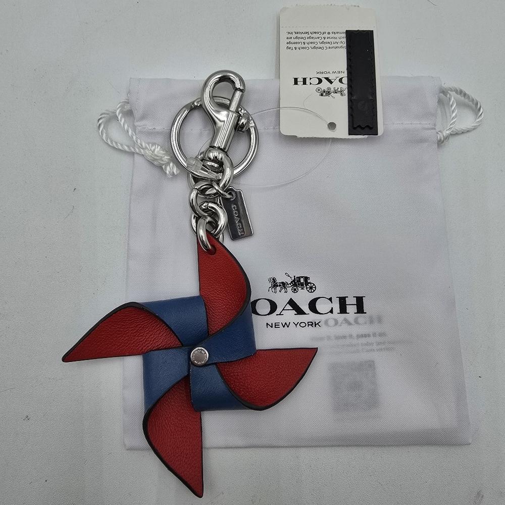 💥NWT💥 Coach Red and Blue Pinwheel Bag Charm/Keychain